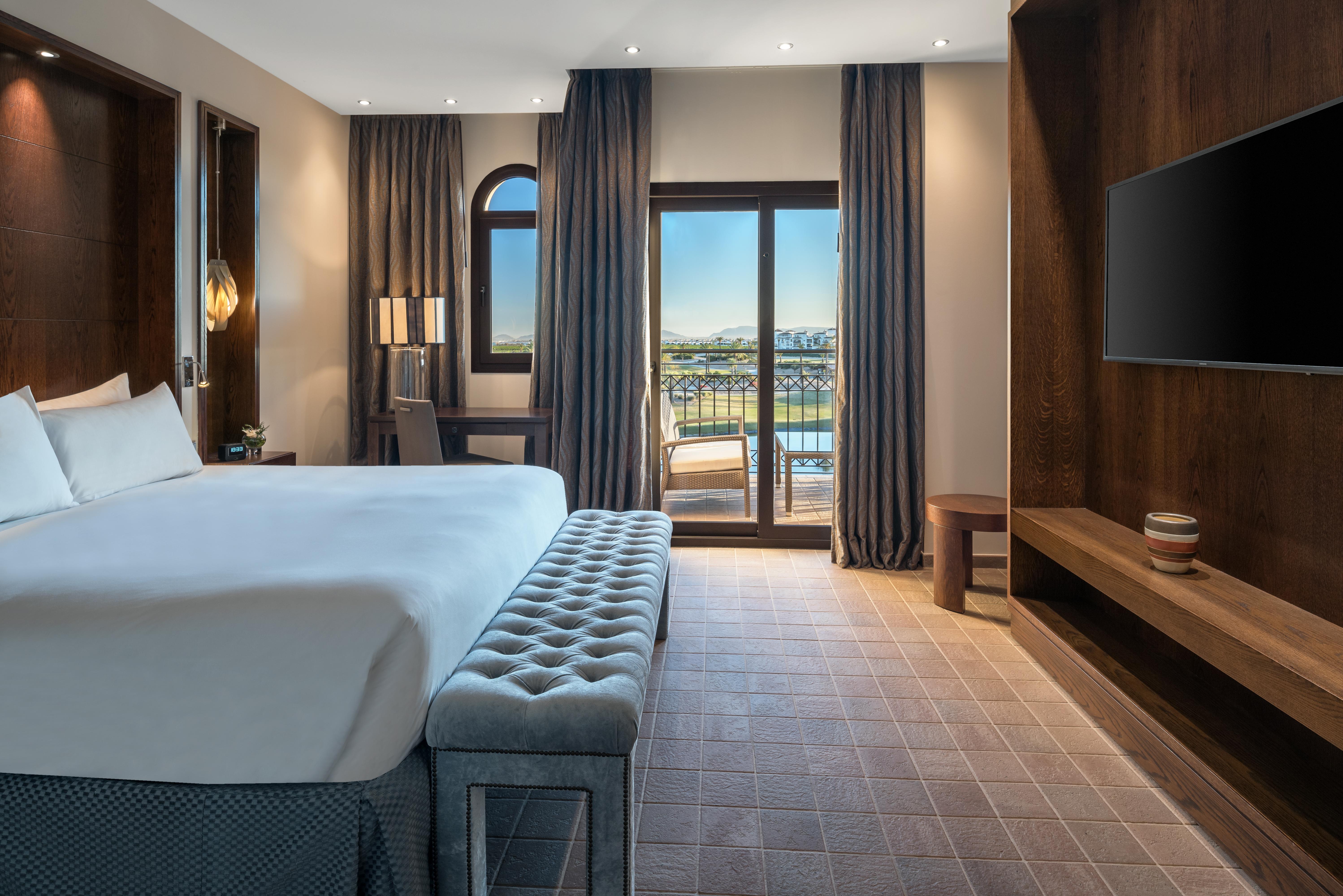 Doubletree By Hilton La Torre Golf Resort Roldan Exterior photo A guest room at the hotel
