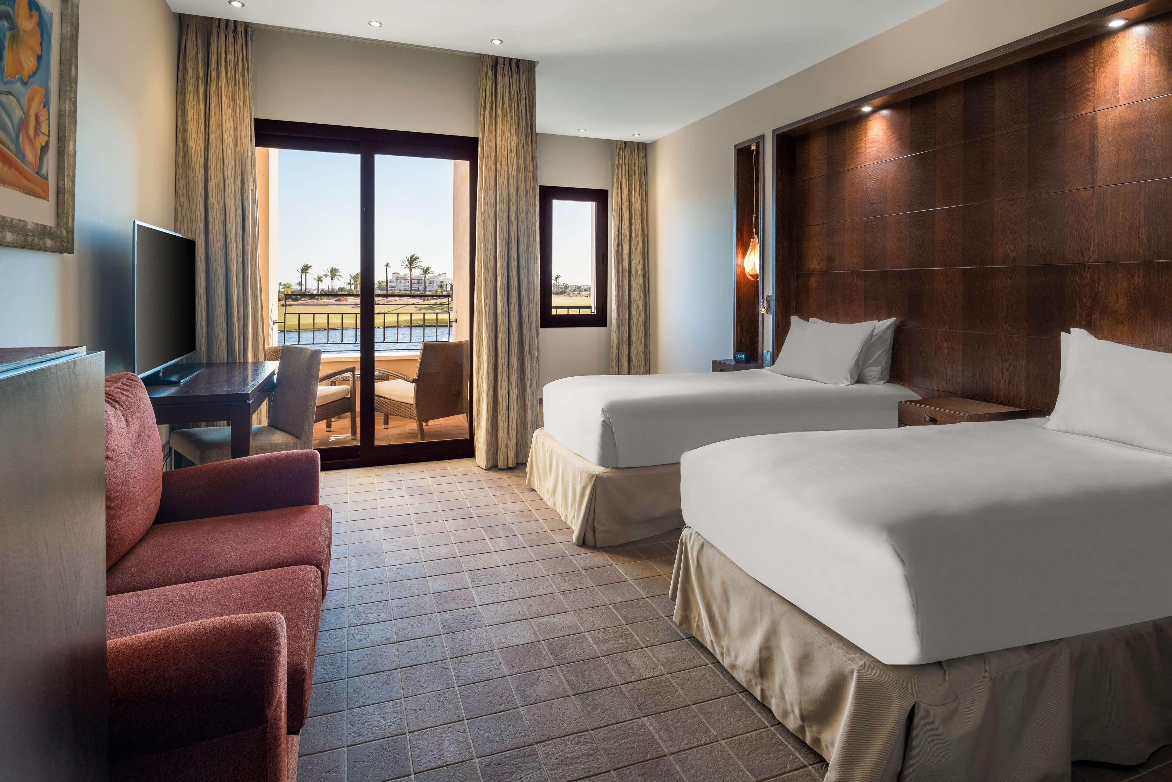 Doubletree By Hilton La Torre Golf Resort Roldan Exterior photo A guest room at the Hilton San Diego Bayfront