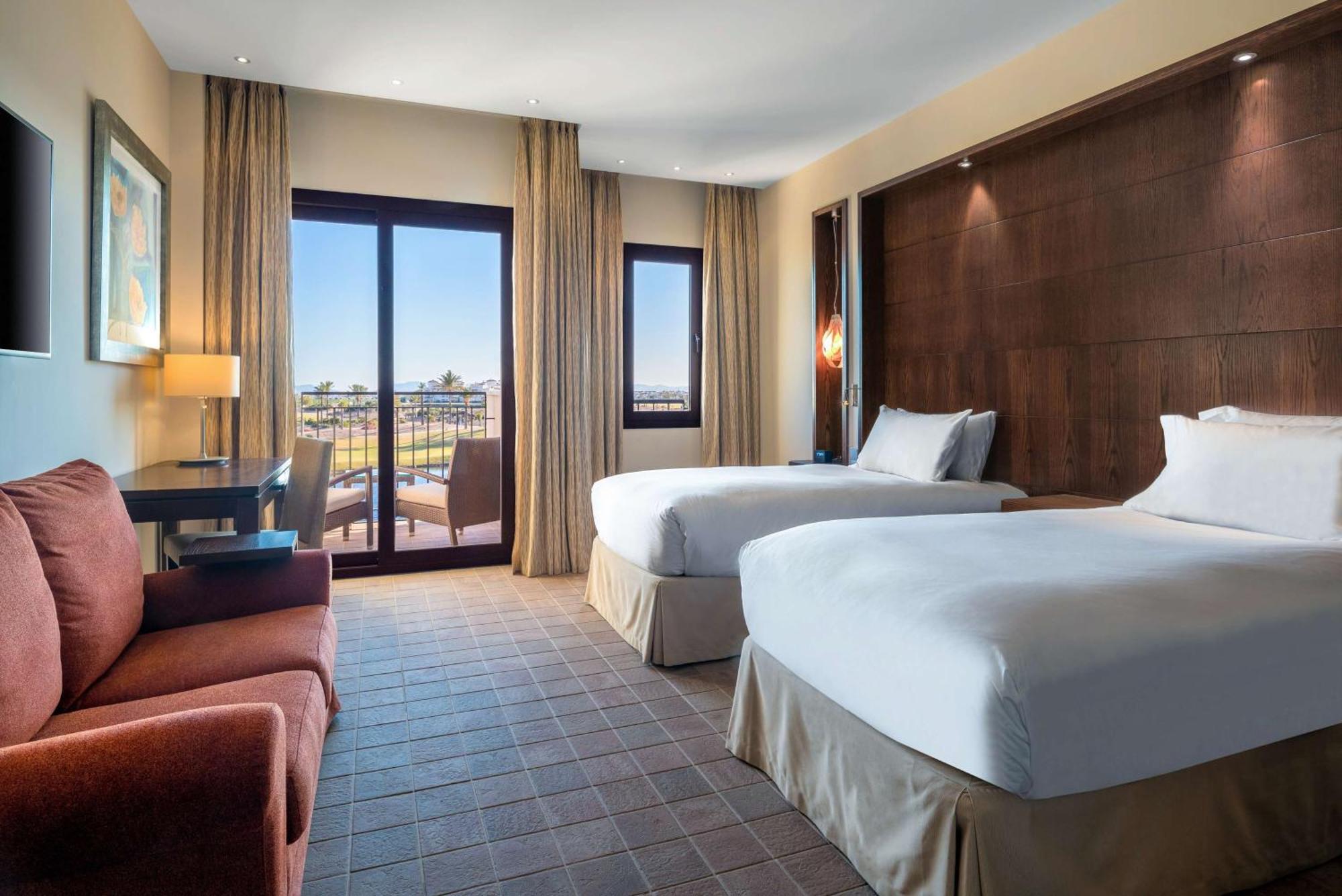 Doubletree By Hilton La Torre Golf Resort Roldan Exterior photo A guest room at the Hilton San Diego Bayfront