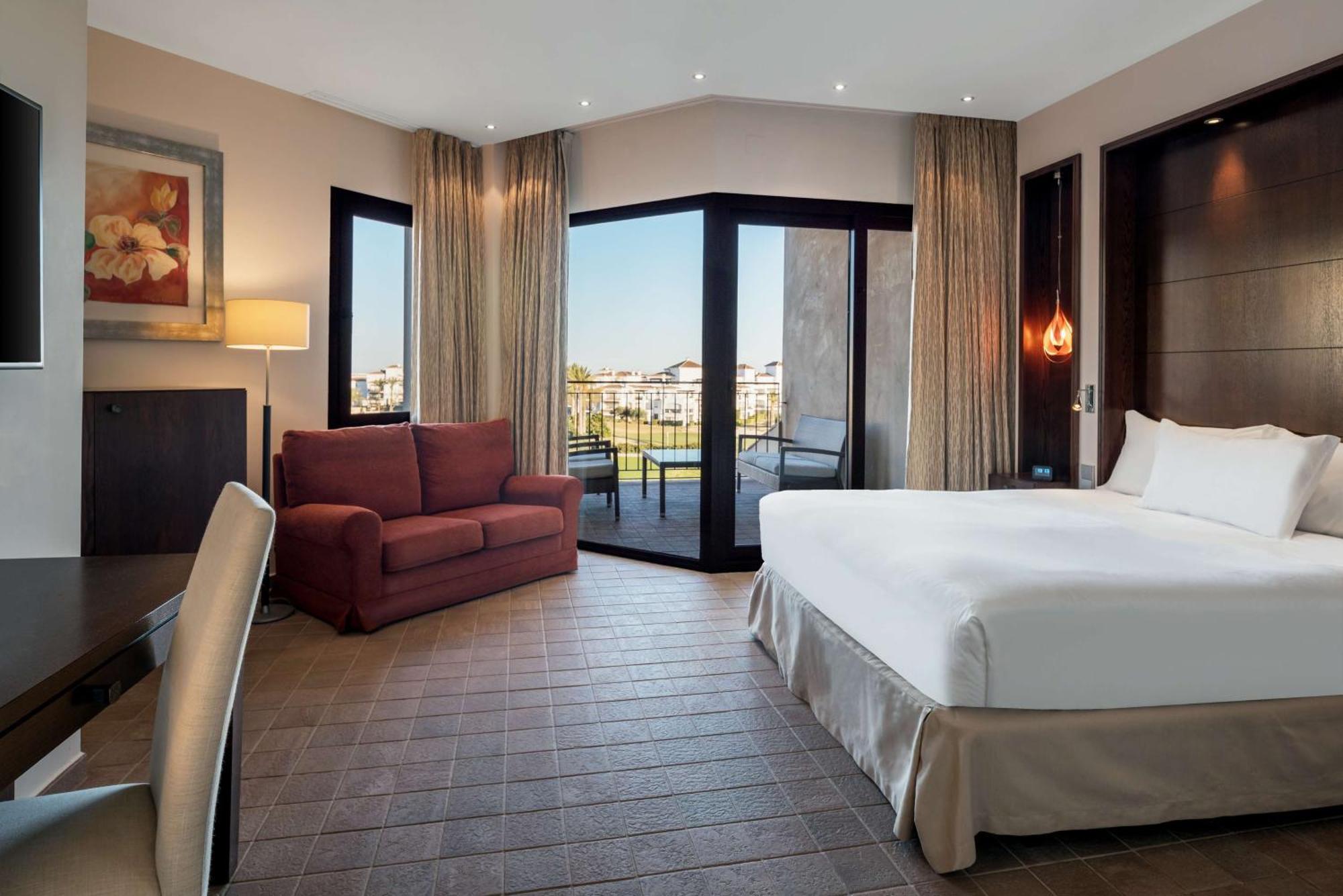 Doubletree By Hilton La Torre Golf Resort Roldan Exterior photo A room at the hotel