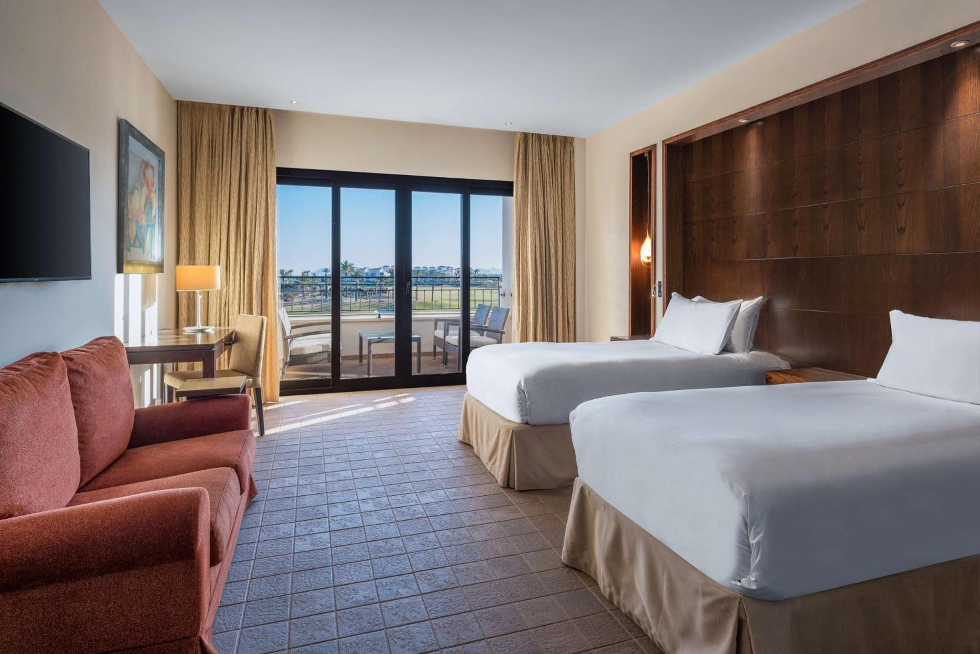 Doubletree By Hilton La Torre Golf Resort Roldan Exterior photo A guest room at the Hilton San Diego Bayfront