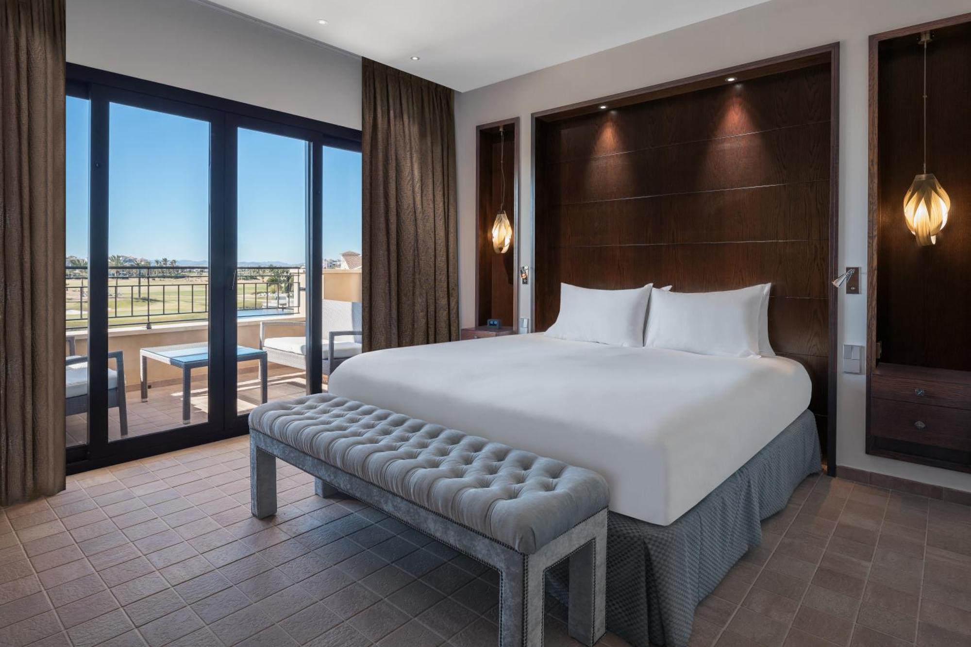 Doubletree By Hilton La Torre Golf Resort Roldan Exterior photo A bedroom at the hotel