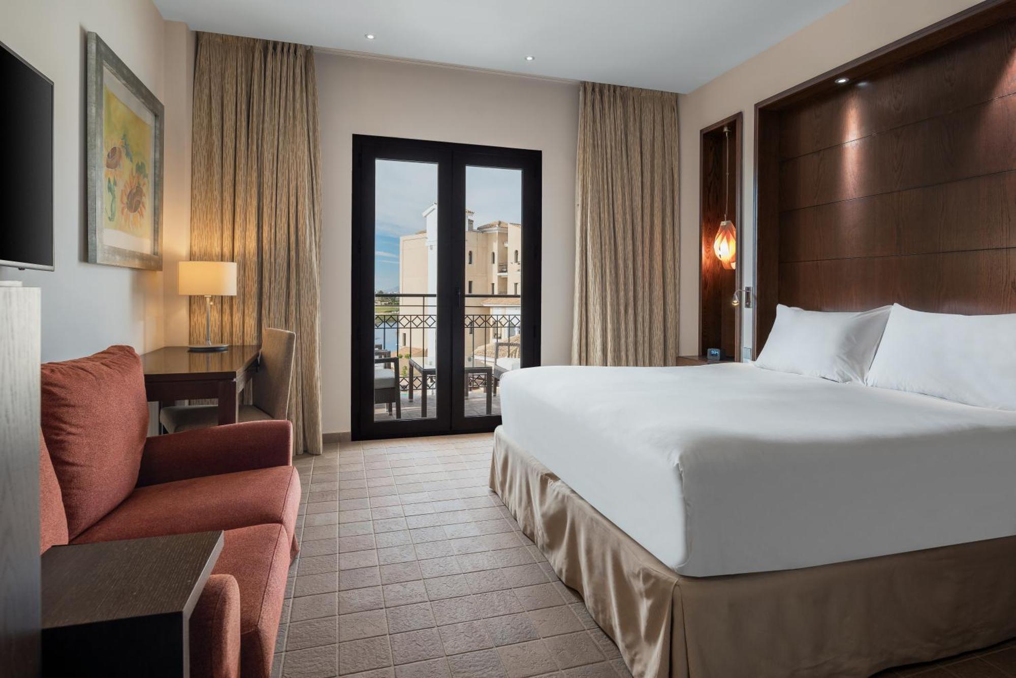 Doubletree By Hilton La Torre Golf Resort Roldan Exterior photo A room at the Hilton Nicosia